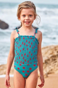 Bañador smock de soles azul claro