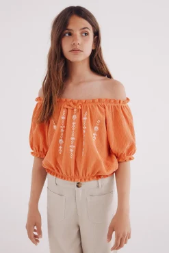 Blusa fruncida para niña