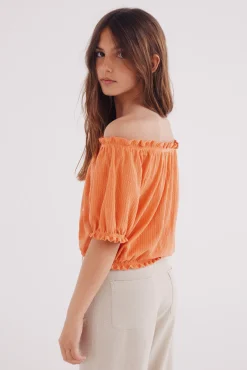 Blusa fruncida para niña