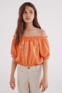 Blusa fruncida para niña