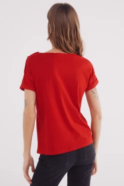 Camiseta lisa manga vuelta botones hombro