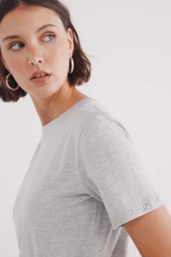 Camiseta ojales metálikcos mangas
