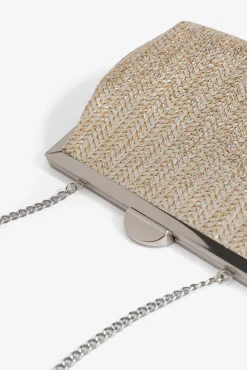 Cartera de mano efecto paja metálica