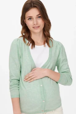 Chaqueta de punto premamá color verde claro.