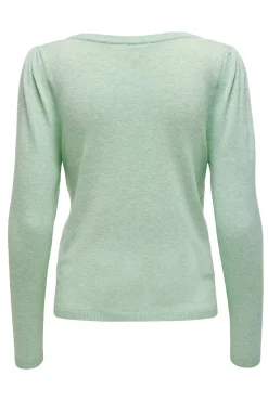 Chaqueta de punto premamá color verde claro.
