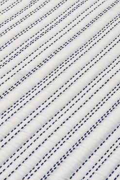 Edredón liso reversible pespuntes