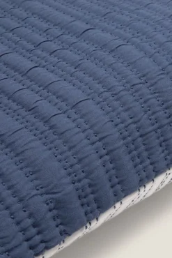 Funda cojín acolchada pespuntes