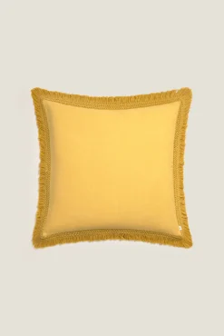Funda cojín algodón flecos