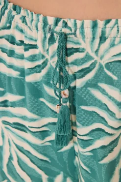 Pantalón largo estampado hojas verde