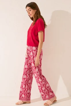 Pantalón largo viscosa estampado hojas rojo