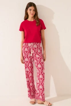 Pantalón largo viscosa estampado hojas rojo