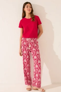 Pantalón largo viscosa estampado hojas rojo