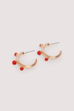 Pendientes bolitas rojas