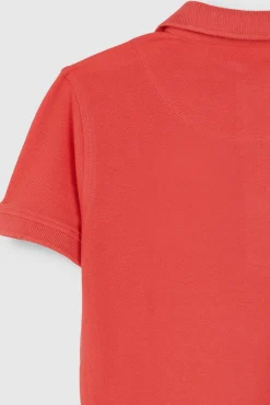 Polo detalles contraste rosa