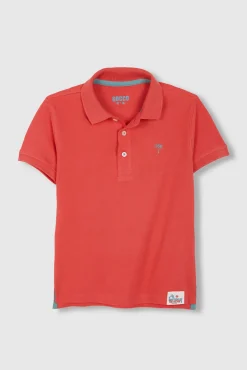 Polo detalles contraste rosa