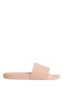 Sandalias slides con logo grabado.