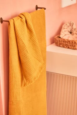 Toalla de baño mostaza Marte