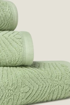 Toalla rizo jacquard hojas