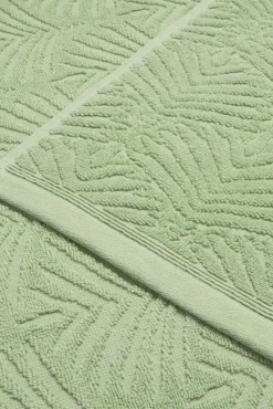 Toalla rizo jacquard hojas