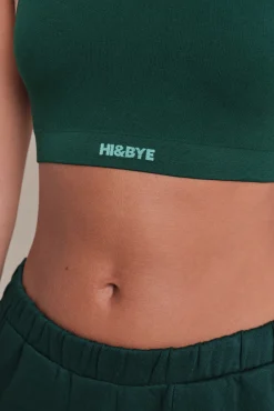 Top deportivo seamless canalé verde oscuro