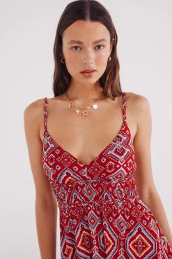 Vestido midi estampado detalles trenzados