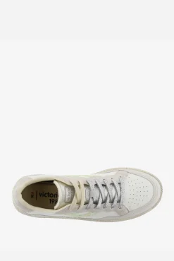 Zapatillas deportivas de mujer con piezas metalizadas y logotipo de glitter